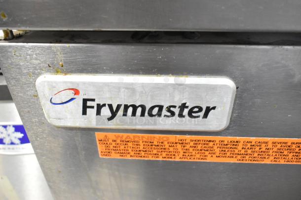 Frymaster GF40SD deep fryer, stainless steel, 122,000 BTU, commercial floor style, with warning label visible.