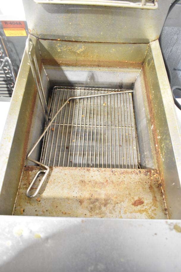 Frymaster GF40SD stainless steel commercial deep fryer, natural gas, 122,000 BTU, shows signs of use.