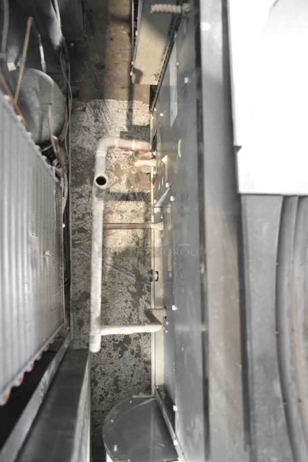 2018 Manitowoc IYT0450W-161 Ice Machine interior. Stainless steel, commercial model, 470 lb capacity, 115V, 1 phase.