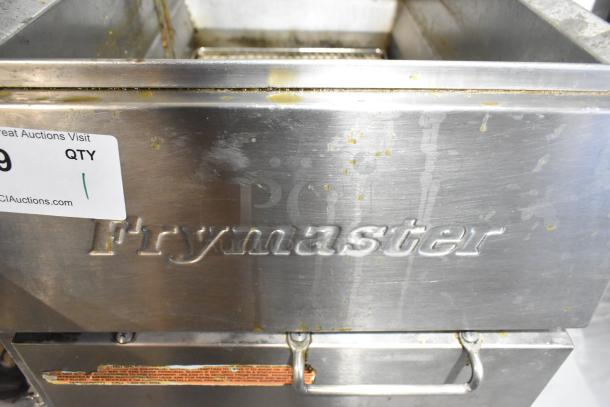 Frymaster GF40SD stainless steel commercial deep fryer, 122,000 BTU, natural gas powered, showing minor wear and Frymaster label.
