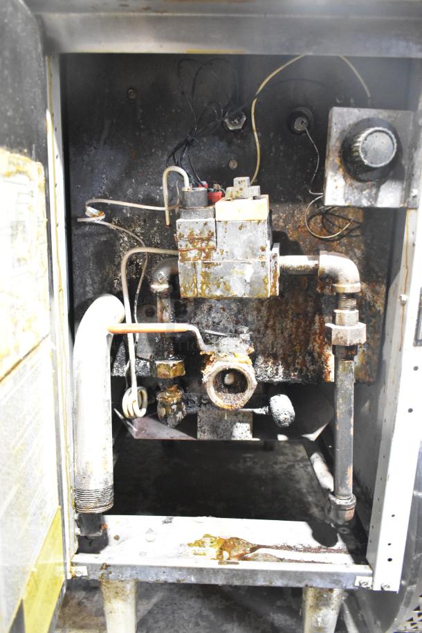 Frymaster GF40SD stainless steel deep fryer interior, showing natural gas components, signs of wear and rust. 122,000 BTU.