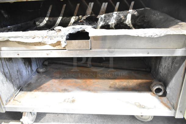 MagiKitch'n FM RMB 36 stainless steel charbroiler grill, natural gas, used condition, with under shelf on commercial casters.