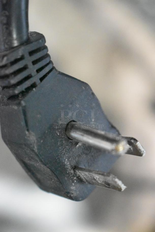 This image shows a close-up of a power plug for the Arctic Air AF23 freezer, indicating 115 volts, 1 phase connection.