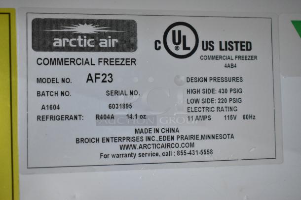 Arctic Air AF23 stainless steel commercial freezer label, showing model, serial no. 6031895, refrigerant R404A, and 115V rating.
