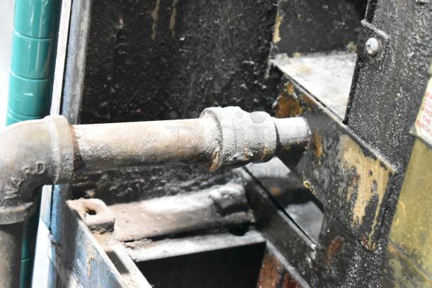 Blodgett commercial gas convection oven pipe connection, showing rust and wear. Suitable for parts or repair.