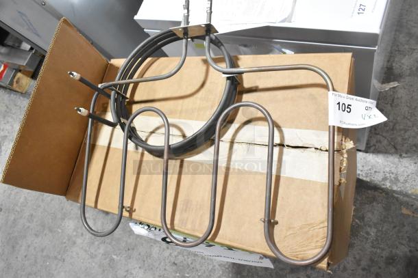 Two metal burners in good condition, coiled wire design, auction tag number 105.