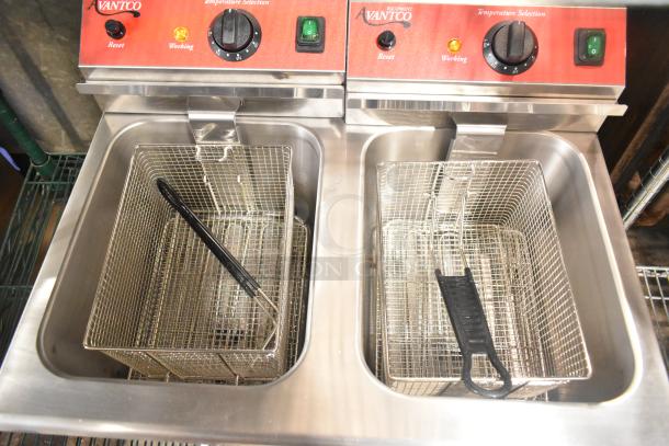 Brand new Avantco 177F202 stainless steel countertop fryer, dual tank, 30 lb capacity, with two metal baskets and lids, 208-240V, 1 phase.