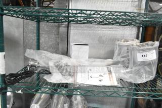 BRAND NEW CK2527B316 Metal Commercial 2 Head Heat Lamp, scratch and dent, 120V, 1 Phase, wrapped in plastic, user manual visible.