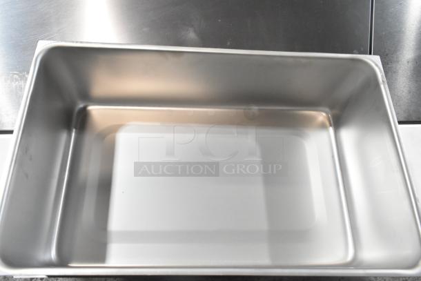 Brand new Vollrath 99765, 6 3/8" deep full-size stainless steel steam table spillage pan, scratch and dent condition.