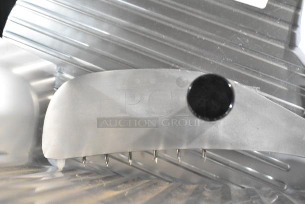 Brand new Avantco SL512 12" manual gravity feed meat slicer. Features and details showcase its robust, efficient design.