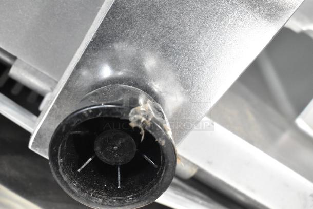 Avantco SL512 12" meat slicer, brand new with visible scratch. Manual gravity feed, 115V, 1 phase. Model 177SL512.