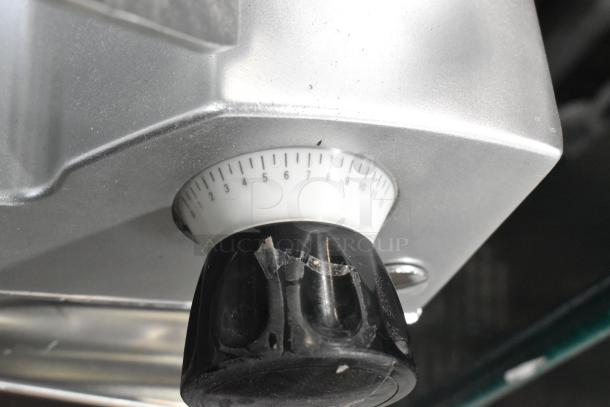 Avantco SL512 12" manual meat slicer, scratch and dent, dial with markings 0 to 9, 115 volts, 1 phase, model 177SL512.