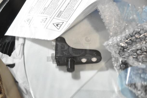 Black refrigerant component for Avantco 193BCR15HCB display case. Includes caution labels and bubble wrap packaging.