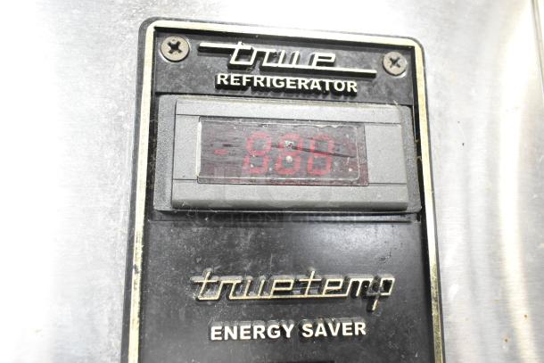Close-up of control panel on True TA1DT-2HS stainless steel cooler, showing temperature display and energy saver label.
