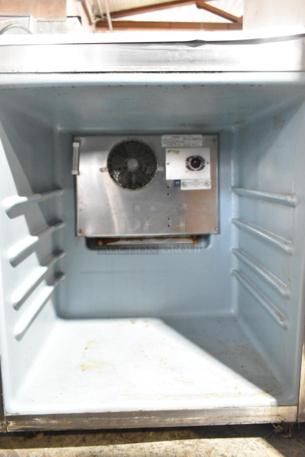 Delfield 406CA-DHL-DD1 stainless steel single door undercounter cooler, interior view, 115 volts, 1 phase.