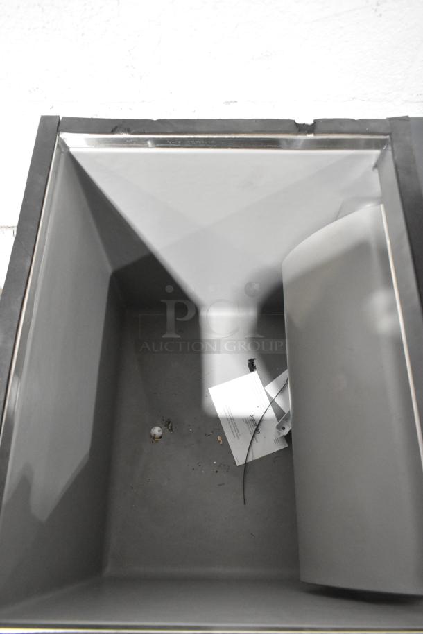 BRAND NEW SCRATCH AND DENT Scotsman B330P stainless steel ice storage bin, 344 lb capacity, interior view, visible labels.