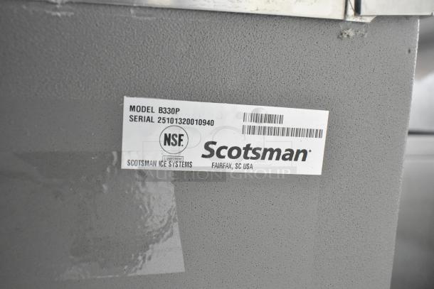 BRAND NEW 2025 Scotsman B330P Stainless Steel Ice Bin, 344 lb capacity, with visible label model and NSF certification. Scratch and dent condition.