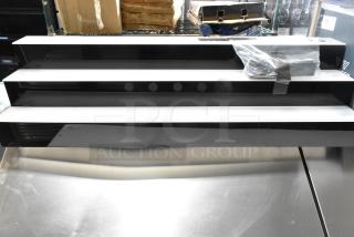 Beverage-Air 185LBD348L three-tiered liquor display, 48" wide, brand new with built-in LED lighting, minor scratches.