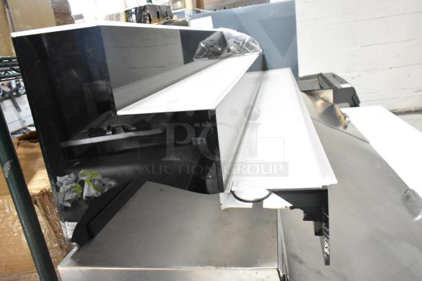 BRAND NEW Beverage-Air LBD3-48L 48" liquor display with three tiers, built-in LED lighting; minor scratches visible.