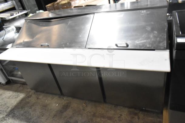 Beverage Air SPE72HC-30M 72" 3-door mega top refrigerated sandwich prep table, new with cosmetic dents. Stainless steel.