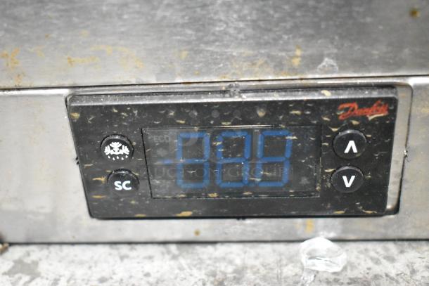 Beverage Air SPE72HC-30M control panel displaying temperature settings. Visible wear suggests scratch and dent condition.