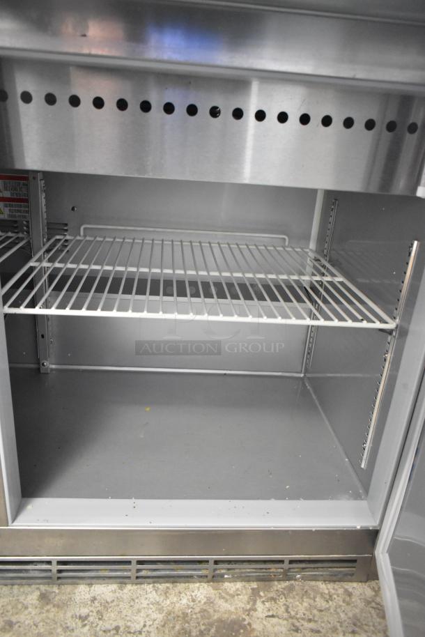 BRAND NEW Beverage Air SPE72HC-30M Elite Series 72" 3-door stainless steel refrigerated sandwich prep table, scratch and dent.