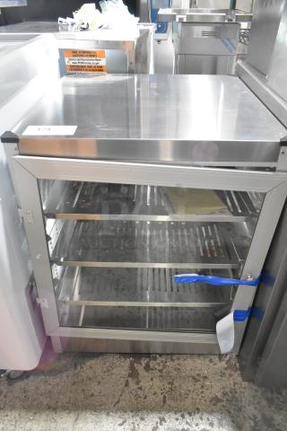 Carnival King HPW-18D2S stainless steel warmer/merchandiser. 18" full-service, new scratch and dent. Tags indicate 120V, 1 phase.