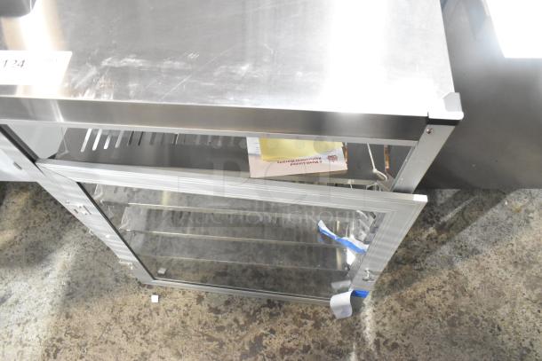 Brand new Carnival King 382HPW18D2S 18" stainless steel warmer. Scratch and dent condition. Full service, 120V, 1 phase.