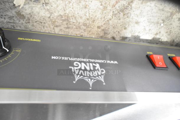 Carnival King 382HPW18D2S stainless steel warmer, new with scratches. Features temperature dial and power switches.