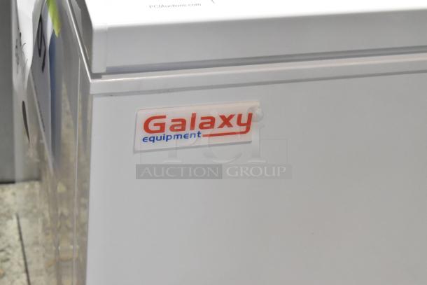 Brand new Galaxy 177CF10HC commercial chest freezer, 9.6 cu. ft., 115 volts, 1 phase, scratch and dent condition. Galaxy label visible.