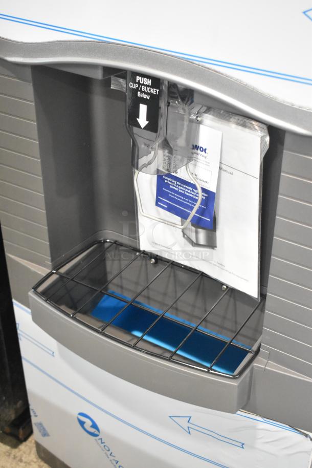 Manitowoc SPA162-161 touchless ice dispenser, 120 lb capacity, 115V, 1 phase, brand new with visible instructions, slight dents.
