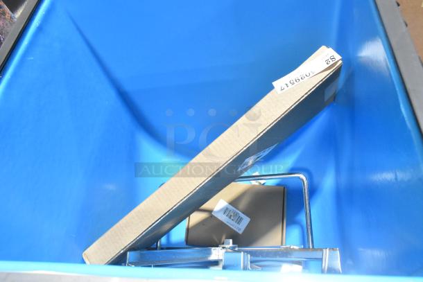 Brand new 2025 Manitowoc SPA162-161, 22" touchless hotel ice dispenser in blue packaging, scratch and dent condition.