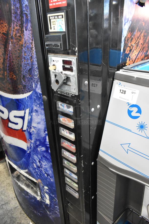 Metal commercial bottle drink vending machine, Pepsi branding, 115 volts, 1 phase, with visible payment options and selection buttons.