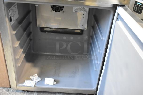 2021 Delfield 406P-STAR4 single door undercounter cooler, stainless steel, commercial casters, 115V, 1 phase, interior view.