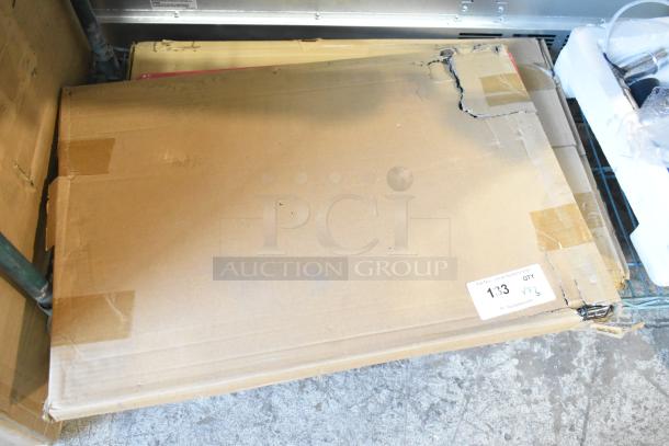 Cardboard box containing new 407FLX6P2418 Choice 24"x18" multi-colored cutting board kit. Box shows minor dents and wear.