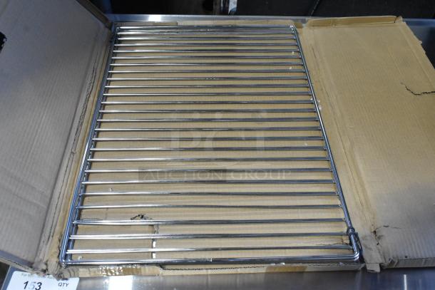 New metal rack, part of the 407FLX6P2418 Choice 24" x 18" cutting board kit. Stored in open box, shows no visible damage.