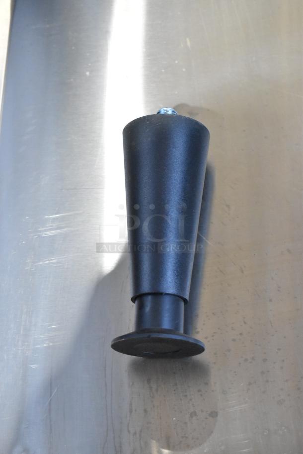 Black cone-shaped component, brand new; part of lot including compressor cover model 17828004C, scratch and dent sale.