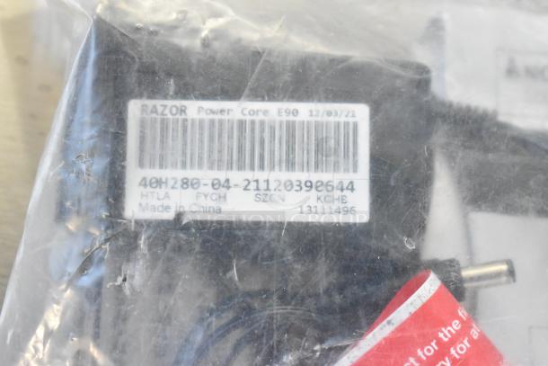 Packaged Razor Power Core E90 part with barcode, model number 40H280-04-21120396, made in China, brand new condition.