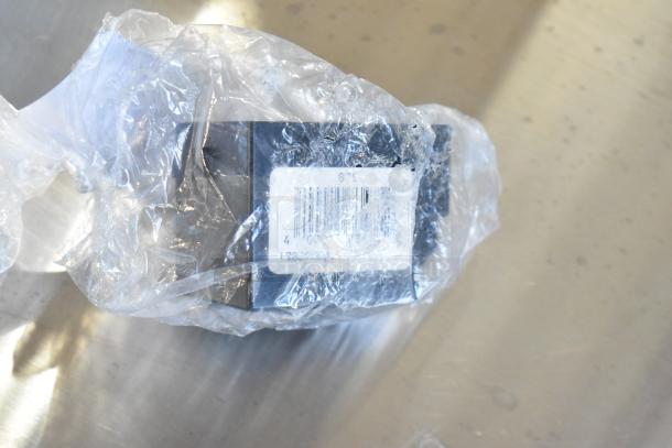 Six brand new, scratch and dent items, including a 17828004C compressor cover, in clear packaging with visible barcodes.