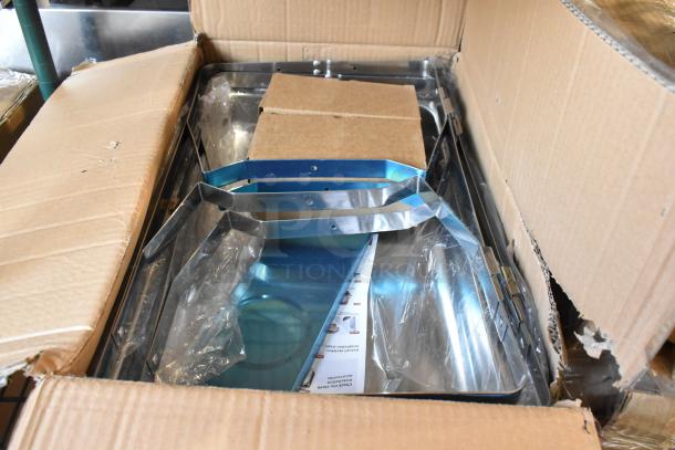 Brand new chafing dish set, scratch and dent condition, packaged in an open cardboard box. Includes metal parts and instruction sheet.