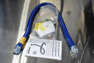 Brand new Dormont 1675KIT48 gas connector kit with 48" hose, quick disconnect, two elbows, and restraining cable.