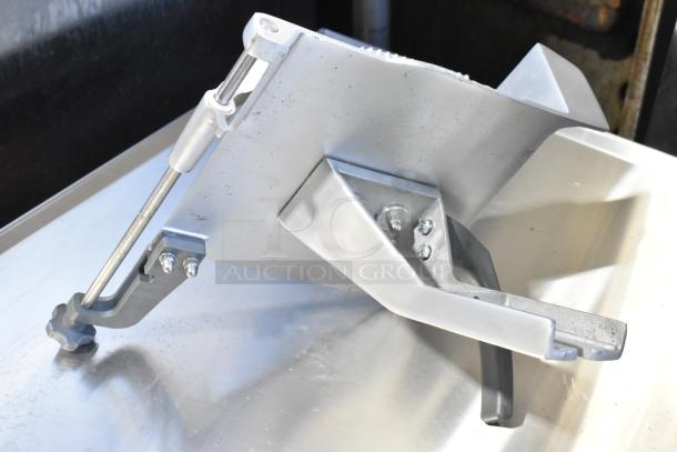 Brand new metal commercial carriage for meat slicer, featuring a durable design with minor scratches and dents, perfect for food service use.