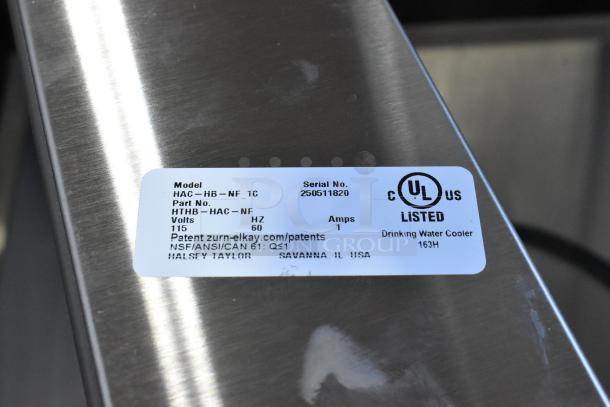 Brand new Elkay HAC-HB-NF-1C water bottle filling attachment, metal, scratch and dent condition, UL listed label visible.