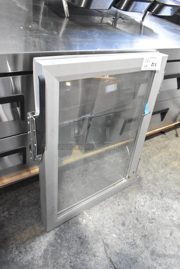 Brand new Avantco glass bottom Dutch door, compatible with HTESDC-1836 and HPESDC-1836 models, with minor scratches.