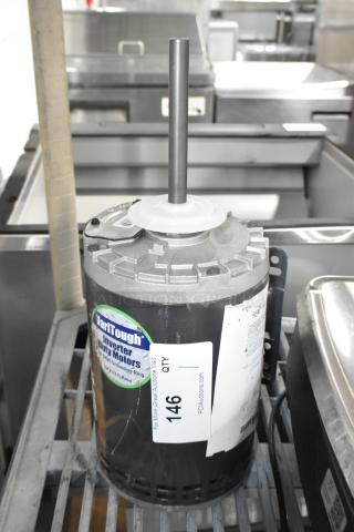 Brand new US Motors J63WZB motor, 208-230/460 volts, with minor scratches, intact labels visible, part number 146.