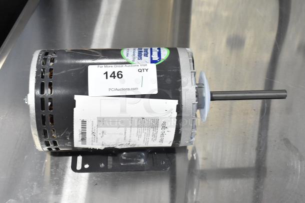 BRAND NEW SCRATCH AND DENT US Motors J63WZB Motor, 208-230/460V, label shows warranty details and auction info.