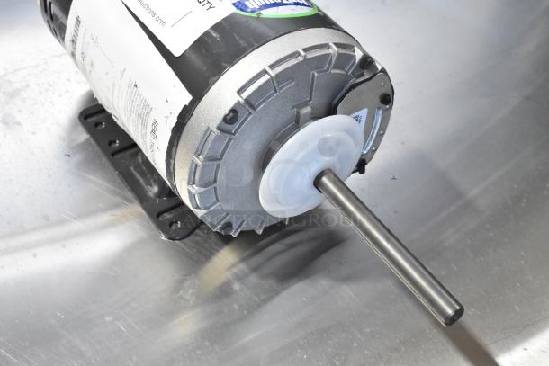 Brand new US Motors J63WZB motor, 208-230/460V, with minor scratches. Note label with specifications.