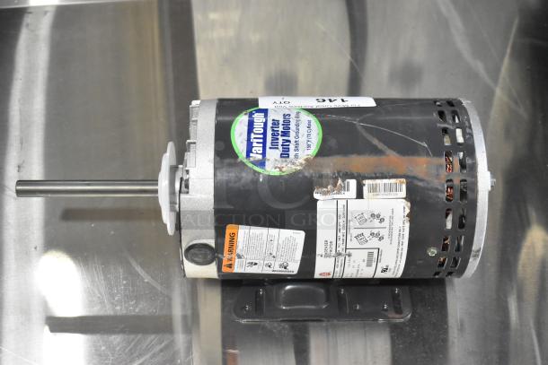 BRAND NEW SCRATCH AND DENT! US Motors J63WZB motor, 208-230/460 volts, with visible labels and scuffs on casing.