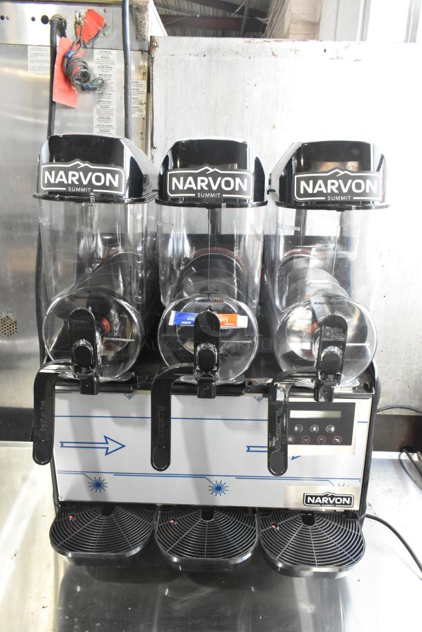 Narvon NSSM3 Summit Triple 3.2 Gallon Granita Machine, 115 Volts. Features three clear containers, push handles, and control panel.