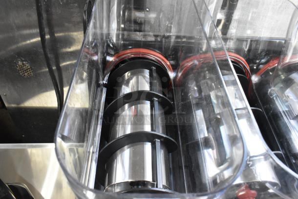 Narvon NSSM3 Summit Triple 3.2 Gallon beverage machine, clear chambers, metal augers, excellent condition, 115V, 1 Phase.